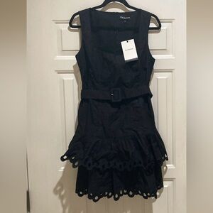 En Saison Black Sleeveless Dress with Belt and eyelet tiee ruffle bottom